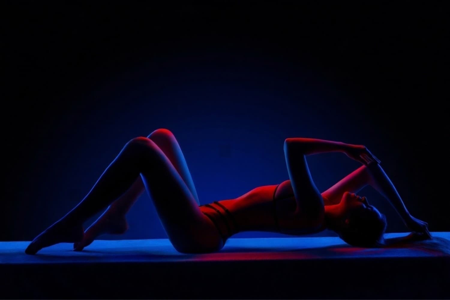 Massage therapist focusing on neck and scalp relief for a guest