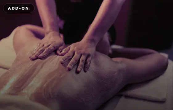 Body scrub applied to the back during a spa treatment